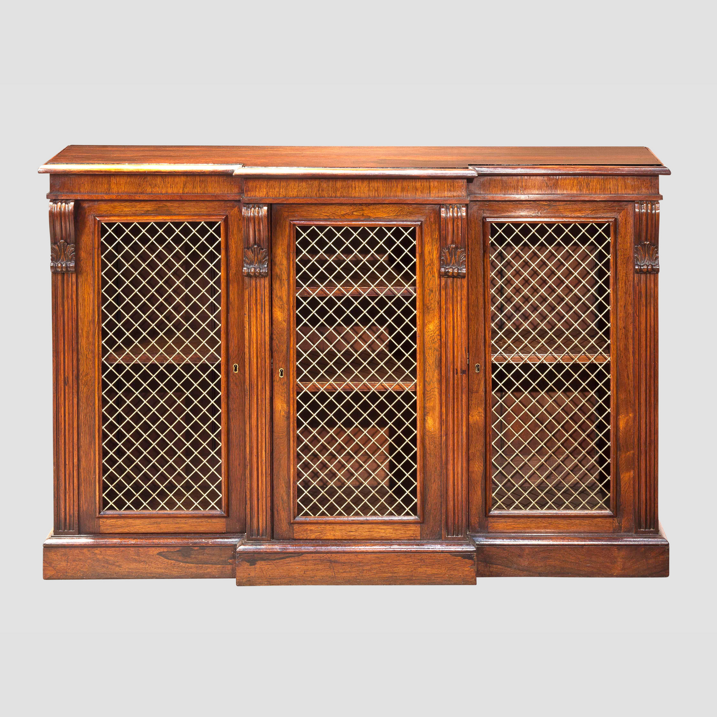 A Fine Small Rosewood Breakfront Cabinet