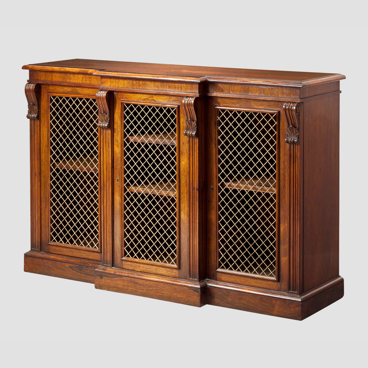 A Fine Small Rosewood Breakfront Cabinet