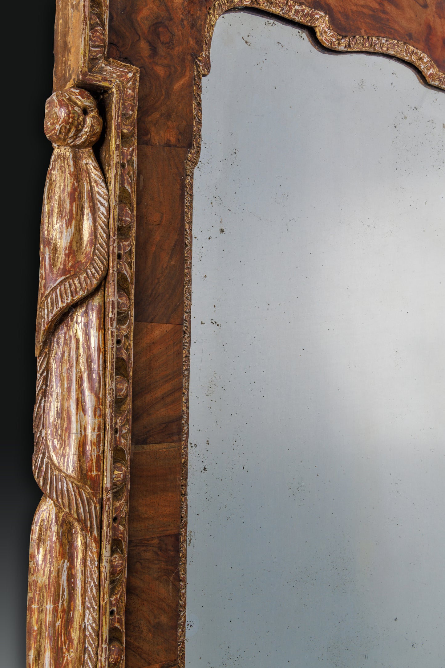 Walnut and parcel gilt, dry stripped mirror