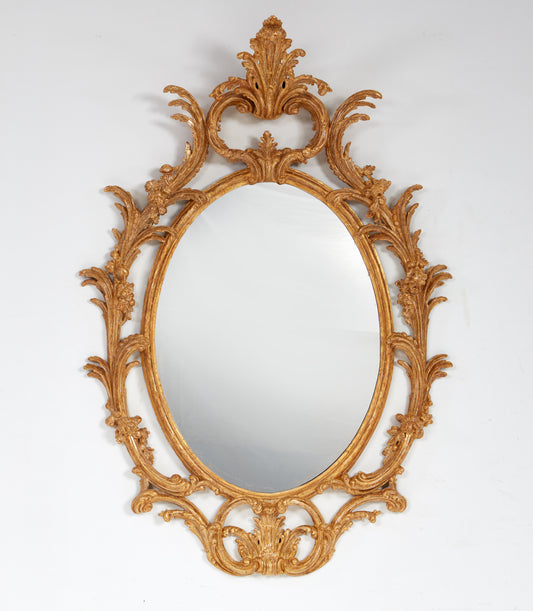 Carved and Gilded Rococo Oval Mirror of Good Size