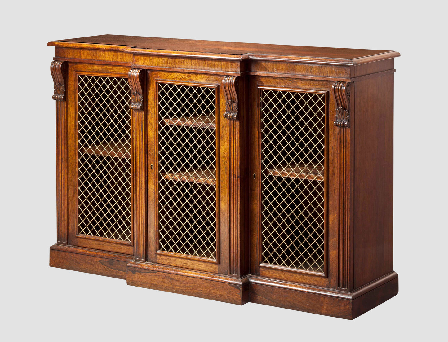 A Fine Small Rosewood Breakfront Cabinet