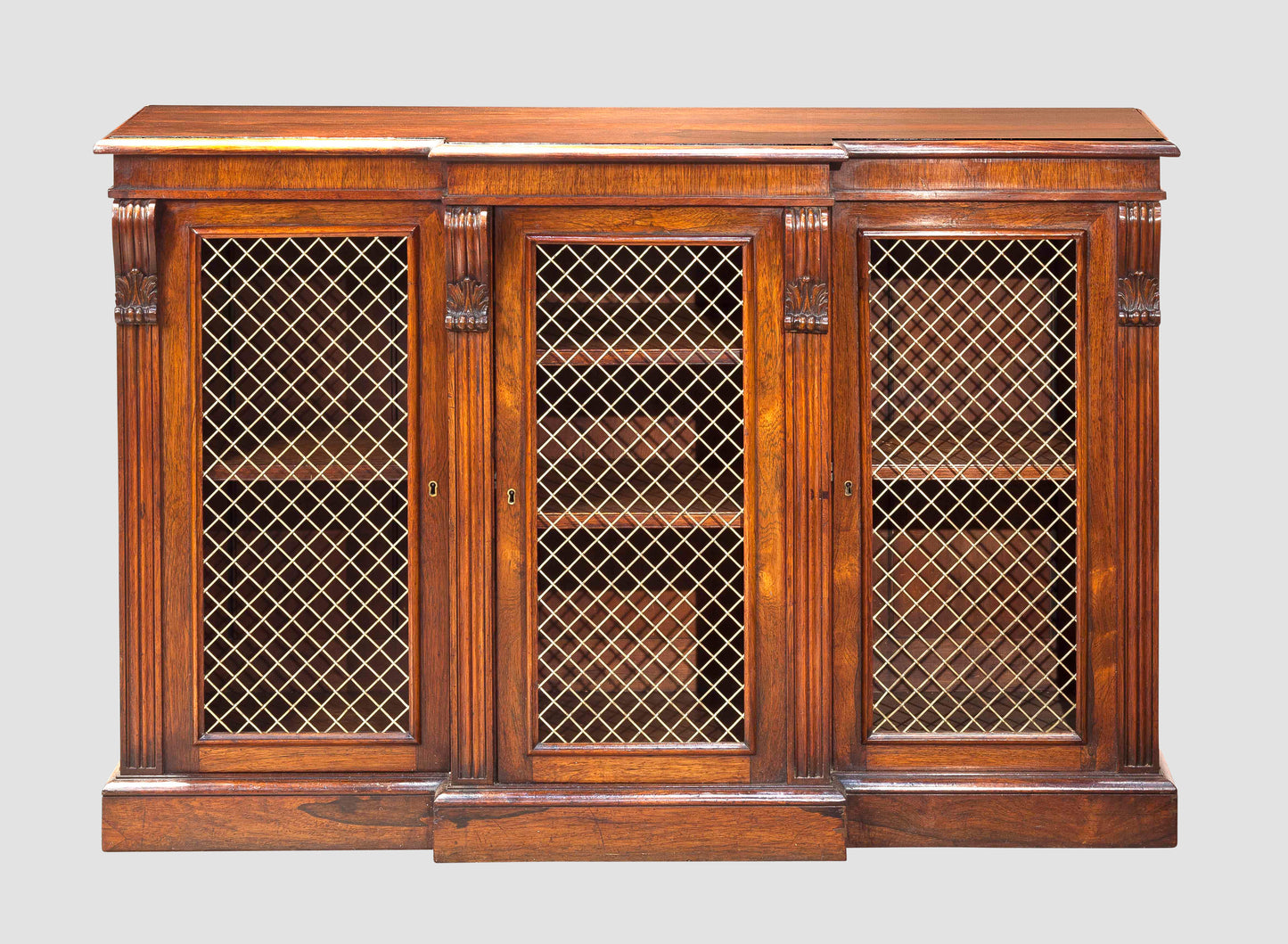 A Fine Small Rosewood Breakfront Cabinet