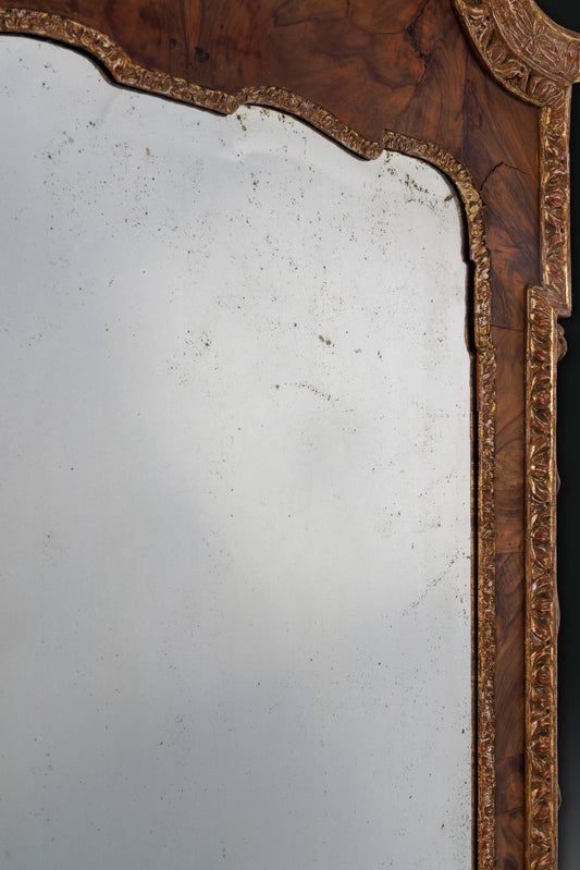 Walnut and parcel gilt, dry stripped mirror